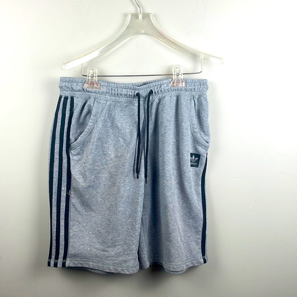 Gray and black adidas shorts